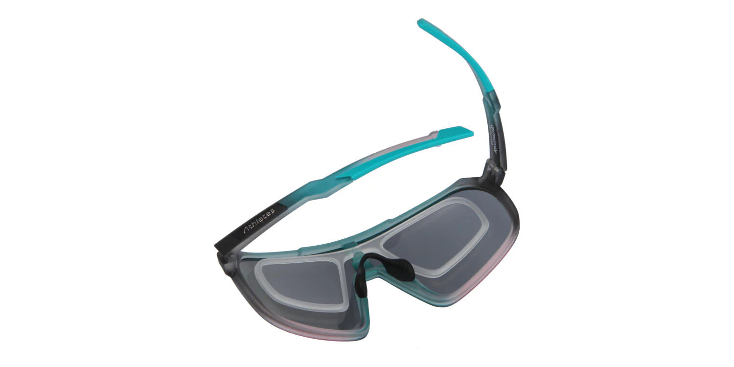 Optically glazed sports glasses with clip-in prescription